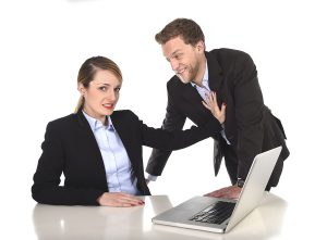 Woman being sexually harassed by boss