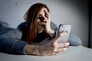 Female employee receives sexually harassing text message.